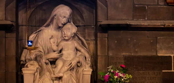 Sculpture of Madonna and Child: on east wall of church nave (by artist/sculptor Louis Reid Deuchars).