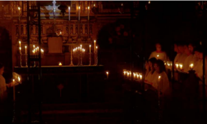 the choir singing by the candlelight